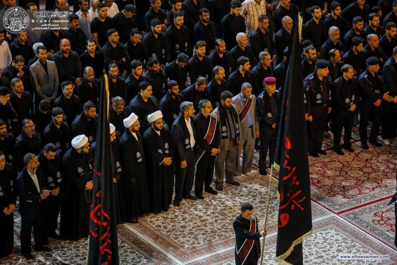 بالصور .. مراسيم استبدال راية قبة الامام الحسين عليه السلام