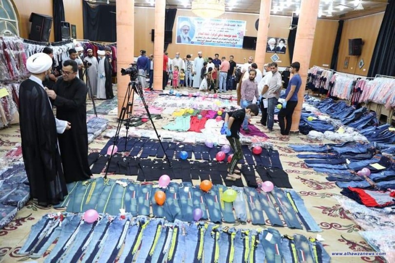 مكتب المرجع اليعقوبي في البصرة يوزع ثلاثة آلاف قطعة لكسوة الايتام والفقراء 