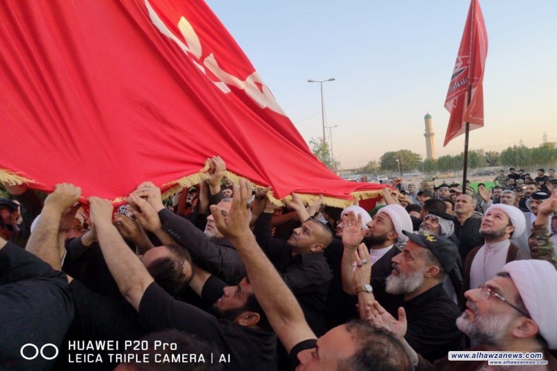 رفع راية ابي الفضل العباس (ع) في سماء بغداد الكرخ  